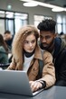 © altitudevisual - shot of a young woman and man using a laptop at university
