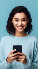 Aufkleber - Generative AI : Happy asian woman feeling happiness blinks eyes and standing hold smartphone on blue background Cute asia girl smiling wearing casual jeans shirt and connect internet shopping online a