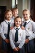 © altitudevisual - portrait of a group of happy schoolchildren posing in their uniforms
