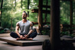 © Jasmina - Young muscular man sitting and meditating outside in the nature