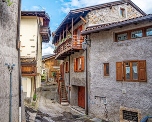 Wall Mural - Small streets of Tenna near lake Caldanazzo in Italy