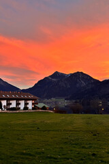 Wall Mural - Beautiful dramatic sky..sunset in the mountains. Bright orange color of the sky.