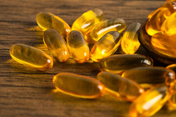Wall Mural - Fish oil Omega 3 capsules vitamin with EPA and DHA isolated on white background.