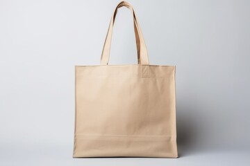 Wall Mural - Beige tote bag without words isolated on grey background. Mock up