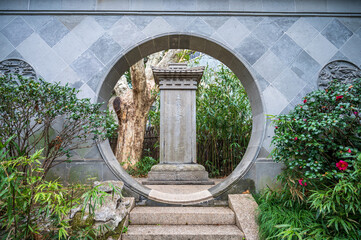 Poster - Chinese city park wall Round gate and stone tablet