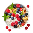 Isolated fruit and yoghurt bowl with cereals and various berries and fruits seen from above.