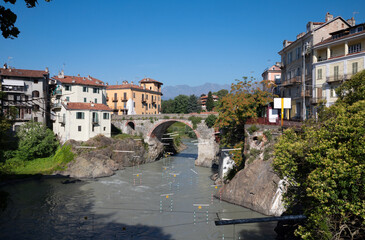 Wall Mural - Ivrea town over the Fiume Dora Baltea river