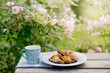 croissants with coffee in garden