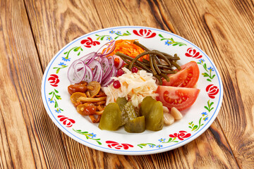 Wall Mural - different vegetables on the wooden background