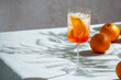 © The Picture Pantry - aperol spritz, cocktail, on a linen tablecloth, shadows, hard sunlight, summer drink in glass