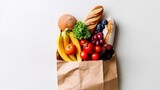 Fototapeta Kuchnia - Paper Bag Filled with Fresh Fruits and Vegetables