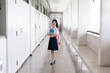 © witsawat - Asian studen back to school for study at Bangkok , Thailand.A cute girl student in a white school uniform is going to school.