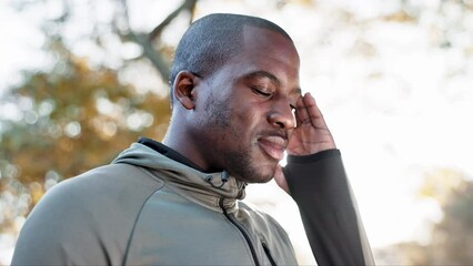 Canvas Print - Black man, headache and pain with fitness in park, brain fog and massage temple with health and wellness. Runner outdoor, medical emergency and migraine with stress, challenge and exercise in nature