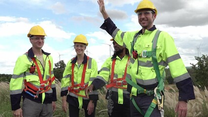 Wall Mural - Technicians at construction site of wind turbine checking and maintenance Electricity wind generator.