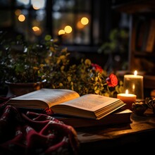 Open Book On The Table With Christmas Candles