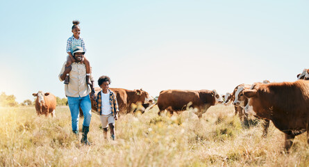 Cattle farm, father and children or family outdoor for travel, sustainability and holiday. Black man and kids walking on a field for farmer adventure in countryside with cows and banner in Africa