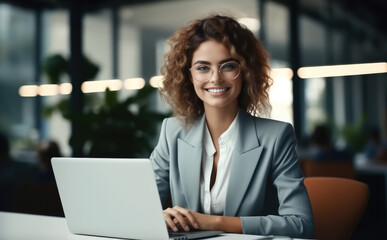 Leinwandbilder - Portrait of cheerful businesswoman smiling at workplace.