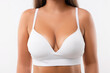 © New Africa - Woman with beautiful breast on white background, closeup