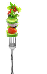 Wall Mural - Fresh salad vegetables on a fork isolated on white transparent background, PNG
