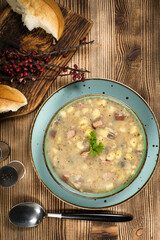 Wall Mural - Traditional polish soup Zurek in ceramic bowl.