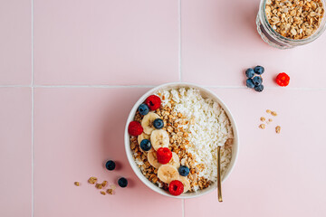 Poster - Healthy protein Cottage cheese breakfast bowl with granola, blueberry and raspberry