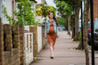 © Victoria Moloman - Beautiful young pregnant woman belly london smiling confident  city street outdoors walk urban cityscape 9 months smiling Active mom Brunet caucasian  summer glasses brown Tight dress Tummy