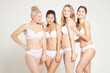 © Connect Images - Young women posing in underwear, real women