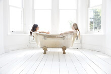 Young Women In Bath Tub