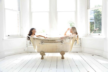 Young Women In Bath Tub