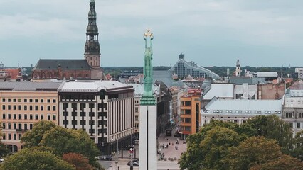 Wall Mural - Beautiful aerial view of Riga city - the capital of Latvia. Statue of liberty Milda - the symbol of freedom of Latvia.