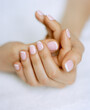 © Connect Images - Woman's hands with French manicure