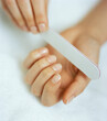 © Connect Images - Woman filing nails