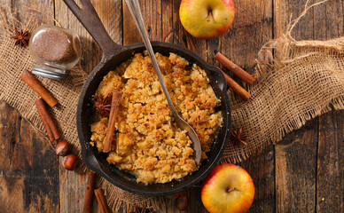 Wall Mural - delicious homemad apple crumble with ingredients