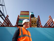 © Connect Images - Dock worker by cargo ship at Port of Felixstowe, England