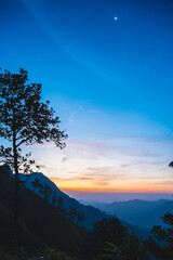 Wall Mural - Beautiful Sunrise on khao khao chang phueak mountian.Thong Pha Phum National Park's highest mountain is known as Khao Chang Phueak