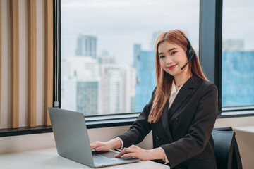 Portrait of female customer support phone at workplace. Woman with headset working and operator. Service call center.