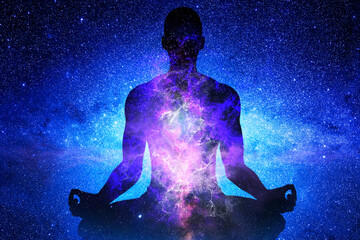 Wall Mural - ilhouette of man with the universe inside him