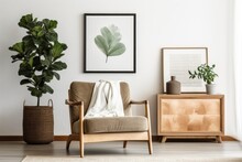 This Living Room Interior Design Exudes Style, Featuring A Mock Up Poster Frame, Comfortable Frotte Armchair, Elegant Wooden Commode, Accompanying Side Table With Plants, And Unique Home Accessories