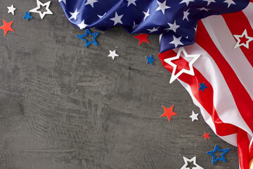 Wall Mural - Exploring the essence of Labor Day in the USA. Top view composition of USA flag, red, blue, white stars on grey concrete background with empty space for advert or message