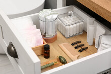 Open Cabinet Drawer With Tampons And Feminine Hygiene Products