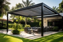 A Fashionable And Modern Outdoor Structure Designed To Provide Shade In A Patio Area, Such As A Pergola Or Awning, Along With A Roof To Cover The Space. It Includes A Comfortable Seating Area