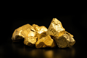 Sticker - The pure gold ore found in the mine on black background