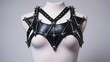 Strappy and edgy faux leather harness bra, featuring daring details that redefine sensuality and make a statement in your wardrobe. Generated by AI.