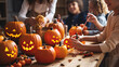 family with little kids preparing pumpkins for holiday Halloween