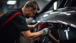 Auto body repair specialist as they meticulously work to fix a dent on the car's fender, restoring both the appearance and structural integrity with precision. Generated by AI.