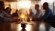 Business Meeting With A Lightbulb In The Foreground Symbolizing Generation Of Ideas 