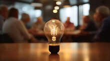Lightbulb In A Business Meeting
