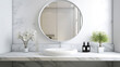 White bathroom interior design, round washbasin, dispenser and plant on white marble counter with round mirror in modern minimalist style 3d illustration.