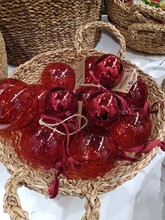 Close Up Of Basket With Red Christmas Tree Balls