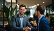 © Bartek - Cheerful Young Manager Welcomes New Employee with a Handshake
